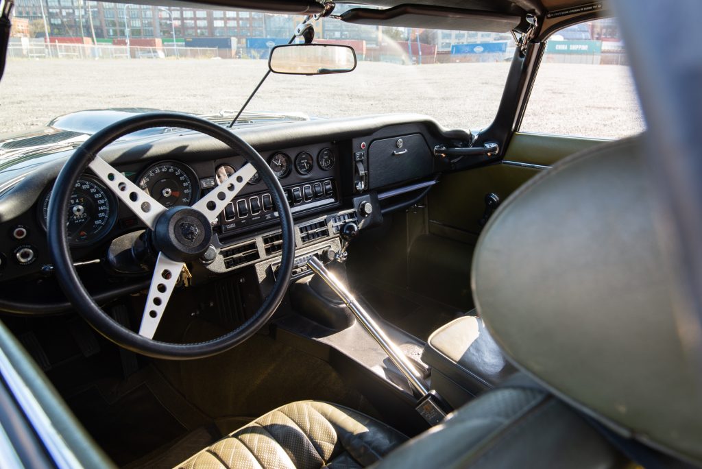 1974 Jaguar E-Type opalescent green interior shot