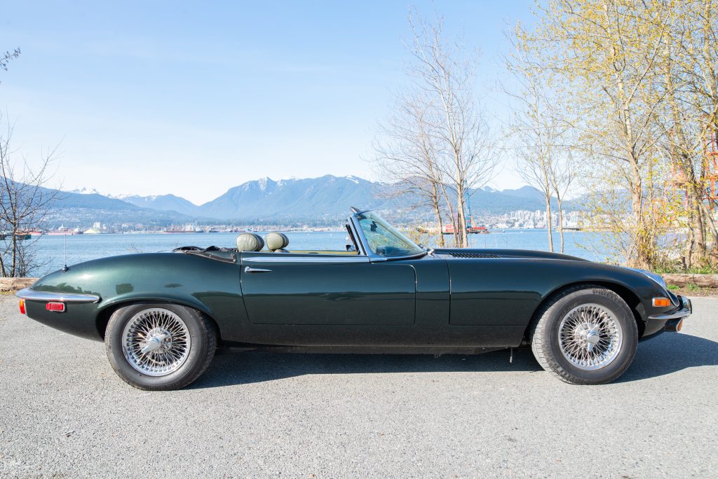 1974 Jaguar E-Type opalescent green profile passenger side