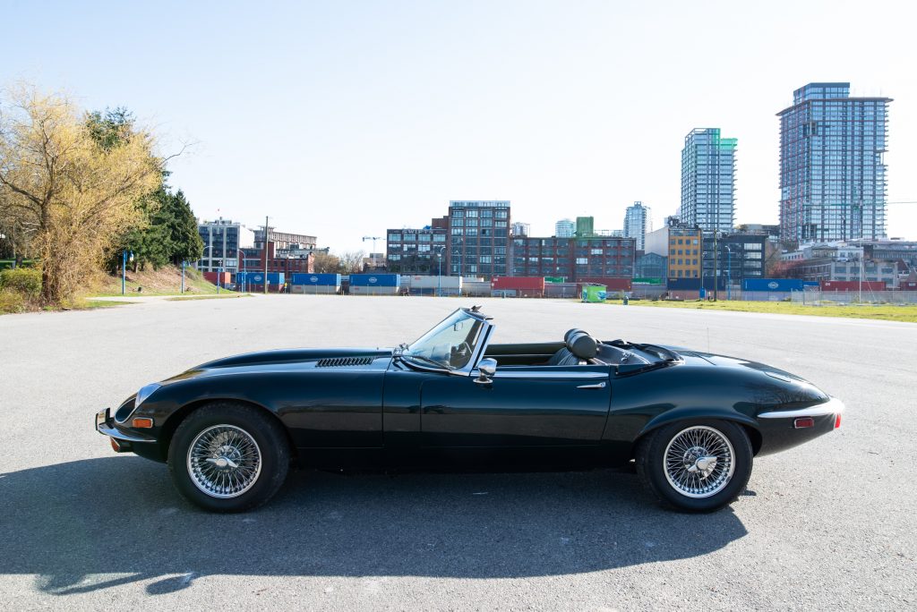 1974 Jaguar E-Type opalescent green profile drivers side